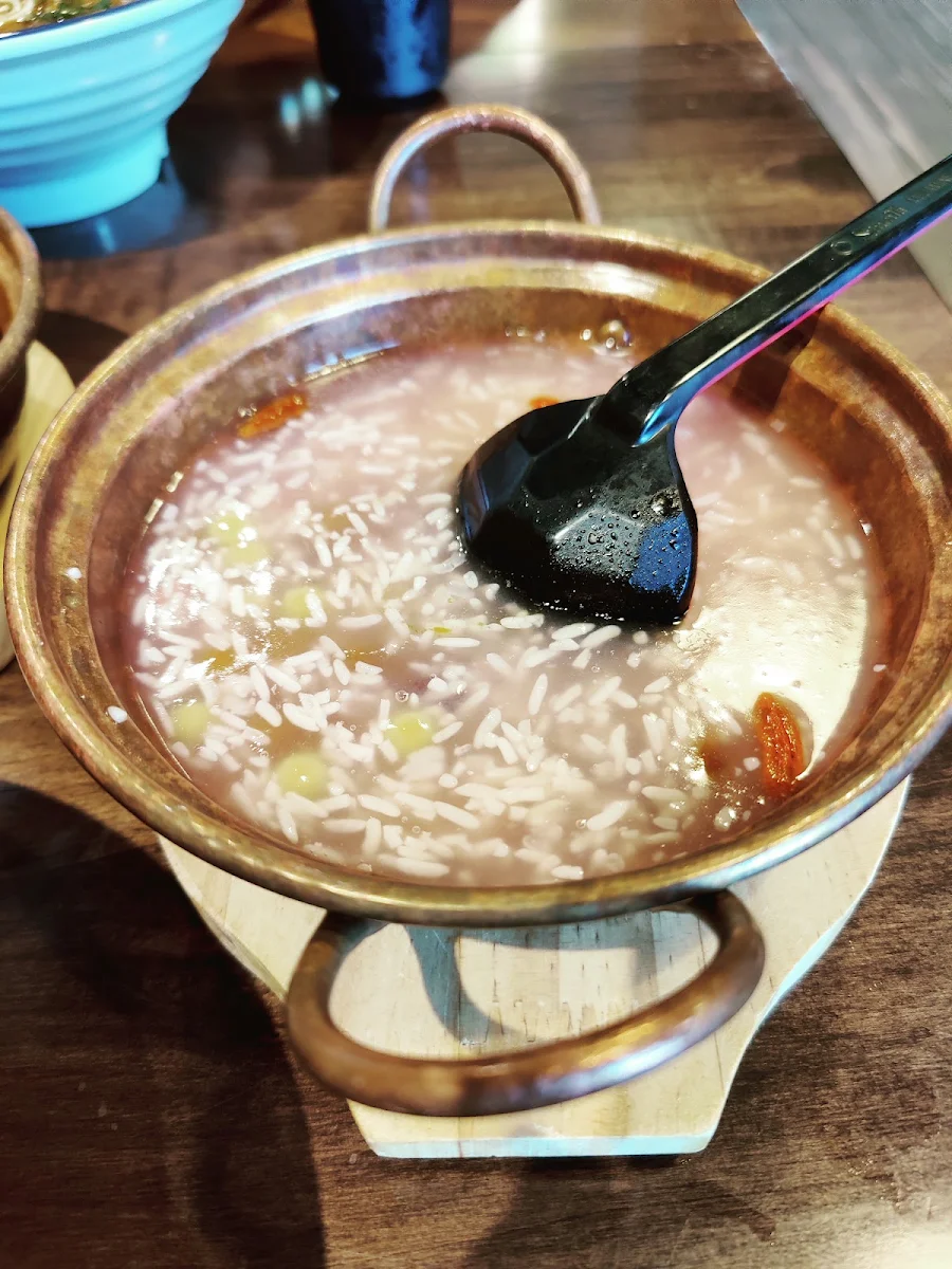 sweet dumplings with sweet rice wine 铜锅酒酿小圆子